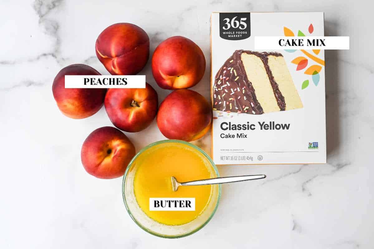 labeled ingredients for peach cobbler with cake mix.