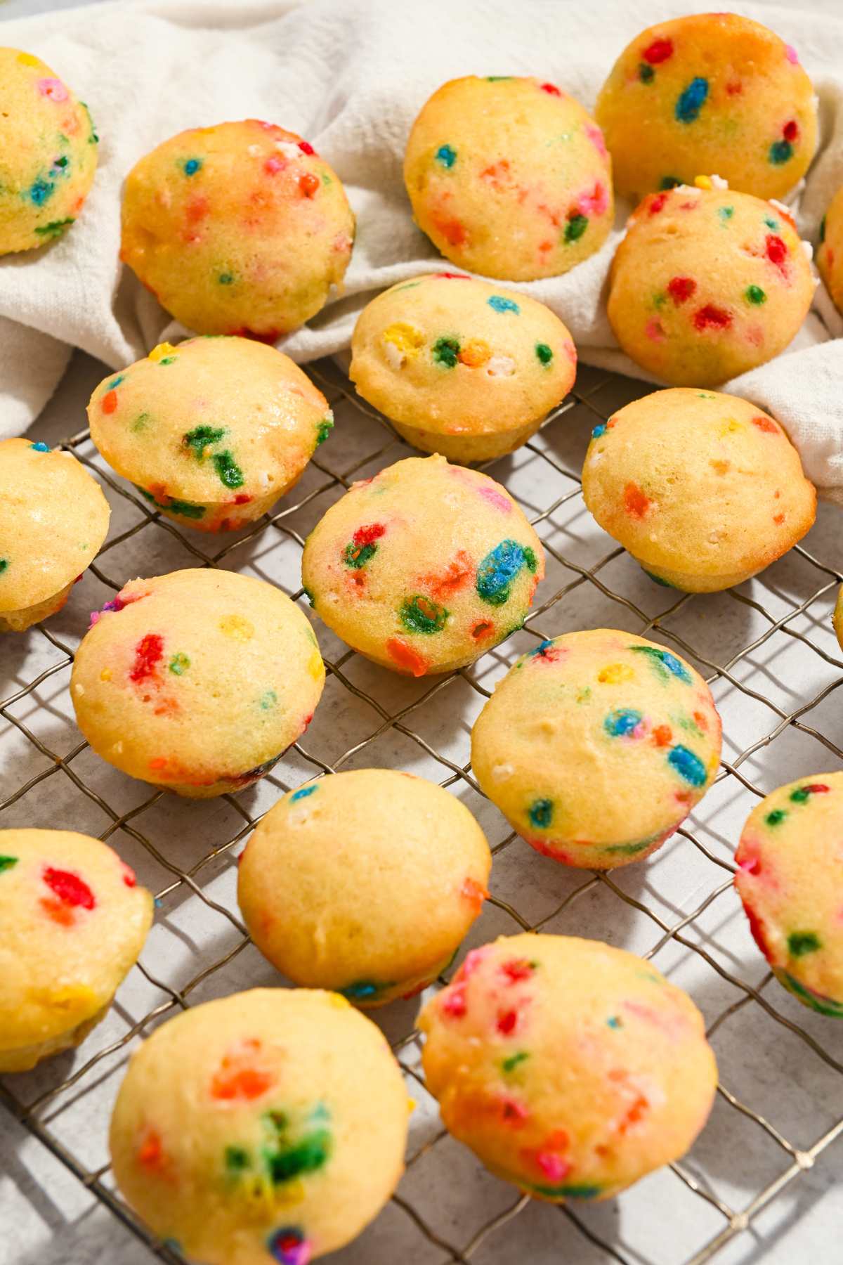 little bites party cake muffins on a cooling rack.