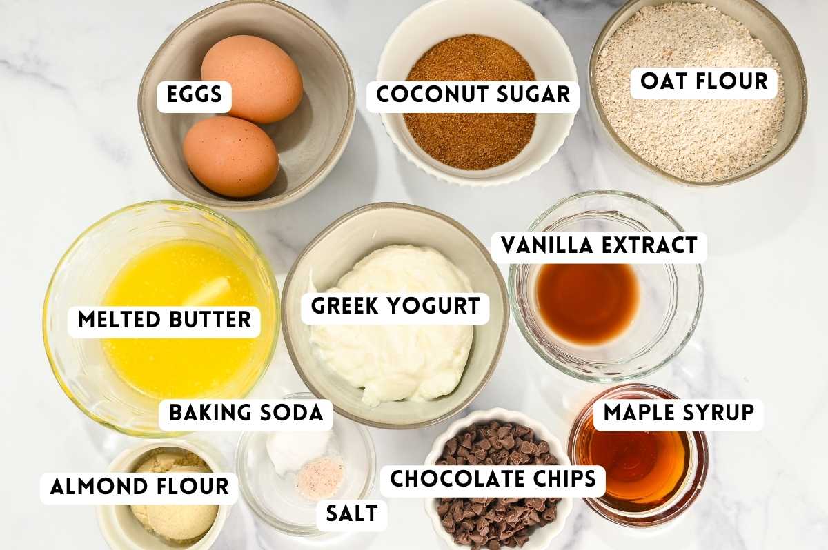 labeled ingredients for making chocolate chip cookie muffins.